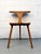 A striking example of Mid-Century Modern design with a Brutalist edge, this three-legged chair (often referred to as a...