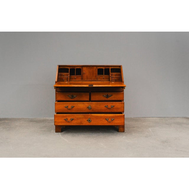 Item: Slant-folding secretary desk Period & Style: Biedermeier - first half of the 19th century Features - stylish and...