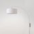 Designed by Peter Morelli in 1960, the Span Wall Mounted Arc Lamp is a modern statement piece featuring a satin nickel...