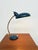 Adjustable table lamp from the 1960s, with a deep duck-egg blue glazed ceramic base and a flexible gold-tone metal arm...