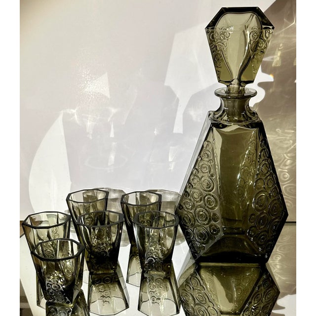 Art Deco Period Moiser Black Crystal Decanter & Cordial Set. It includes six cordials and the decanter with Rene Lalique...