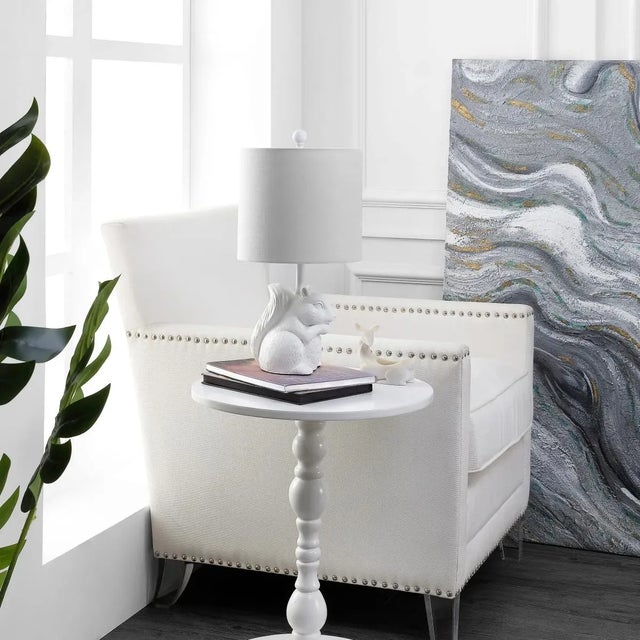 Brighten your space with the charming Sunny Squirrel Lamp. This delightful piece combines whimsy with elegance, featuring...