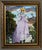 This artwork presents a figure dressed in an elaborate lavender gown, holding a lamb and wearing a whimsical mask of a...