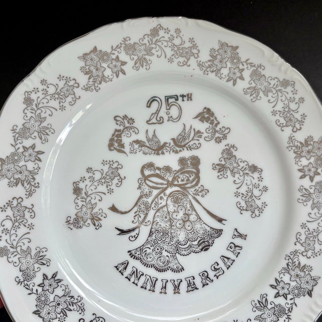 This vintage 25th anniversary plate by Norcrest features delicate silver detailing, soft floral accents, and a classic...