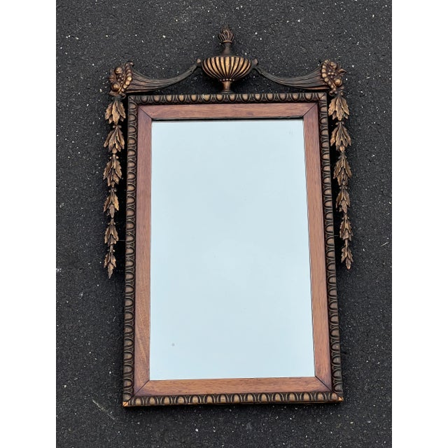 This 19th Century Neoclassical Mahogany Mirror, circa 1880, exudes the grace and elegance characteristic of Neoclassical...