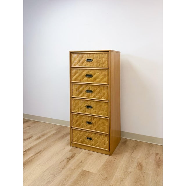 This striking vintage Dixie parquet tall chest of drawers is a beautifully crafted and collectible Hollywood Regency and...