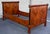 Stunning flamed Mahogany woodgrain is the star, the subtle curves, black columns, rosettes and gilt details add the...