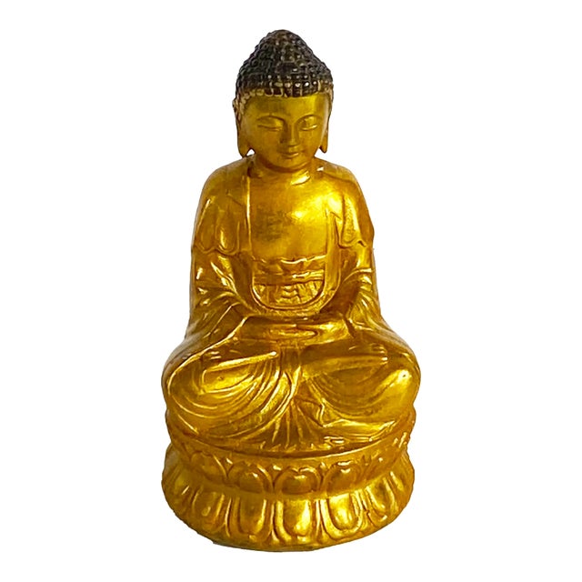 This exceptional vintage gilt bronze Buddha depicts a peaceful and serene expression while seated in meditation. Measuring...