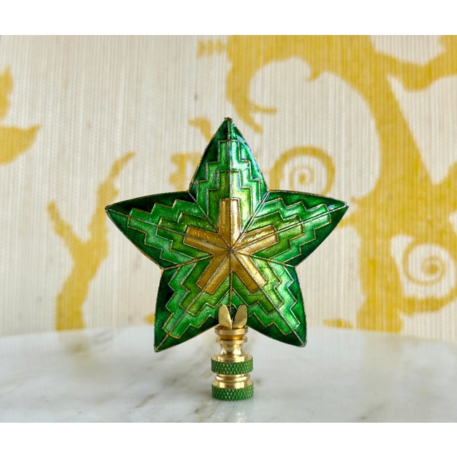 Add an unexpected pop of holiday cheer to the top of your favorite table lamp with this designer lamp finial, hand-crafted...