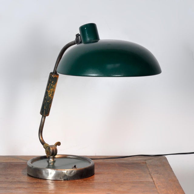 Discover a true design icon: the Kaiser Idell table lamp, a masterpiece by renowned Bauhaus designer Christian Dell. This...