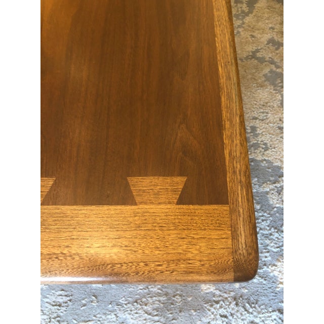 Classic sleek Lane "Acclaim" coffee table designed by Andre Bus having the signature dovetailed inlay design with a mix of...