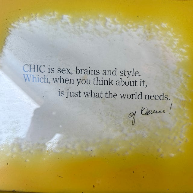 Vintage "CHIC is sex, brains and style." advertisement. Yellow and white, framed.
