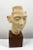 This refined reproduction bust, bearing the stamp “Musée du Louvre – Reproduction Interdite – Atelier de Moulage”,...