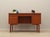 The desk was made in the 1970s, Danish production. The structure and the top are covered with teak veneer. The legs are...