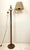 Rare floor lamp 1960s. Beautiful minimalist design of turned wood with a swing arm that is adjustable in height. Made in...