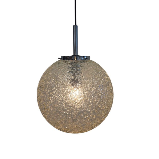 A stunning Big Ball frosted glass pendant light by Hoffmeister Leuchten, a true gem from the 1960s. This exquisite light...