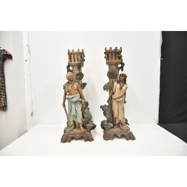 Monumental Pair of Austrian Terracotta Figural Lamps AUSTRIAN TERRACOTTA MONUMENTAL FIGURAL LAMPS OF ORIENTALIST FIGURES...