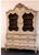 Distinctive serpentine (curved) doors Heavy hand-carved crest and apron at the top Painted, distressed white or cream...