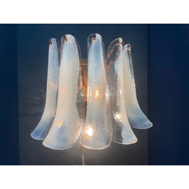 Murano glass sconces, set of 2 this elegant pair of handblown murano glass sconces features beautifully shaped, elongated...