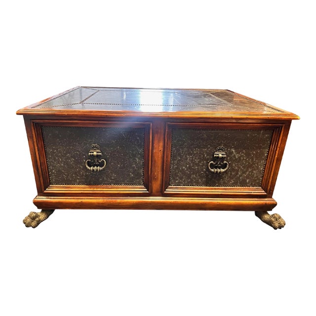 Theodore Alexander Armoury Collection Brass Clad Cocktail Table With Paw Feet For Sale