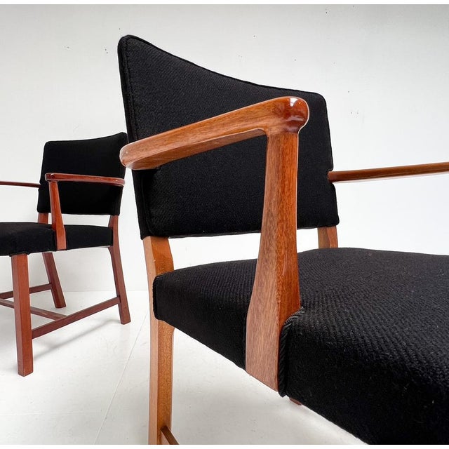 This set of mahogany lacquered chairs are a design by Erik Bjørn olsen from the 1960s. The chairs are upholstered with...