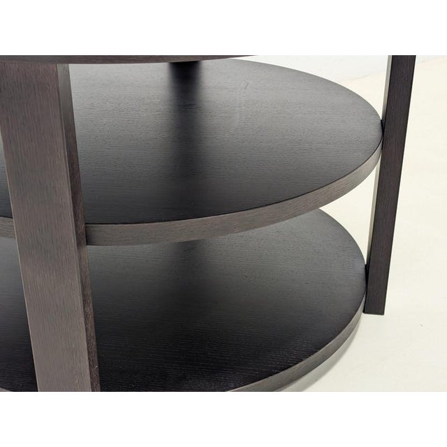 The Berlino Coffee Table by Casamilano is a refined, contemporary wooden low table designed by Massimiliano Raggi....
