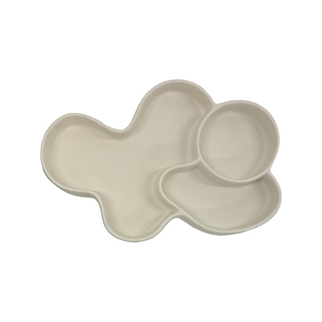 The sculptural form brings an art-driven presence to any space, blending soft curves with architectural silhouettes....
