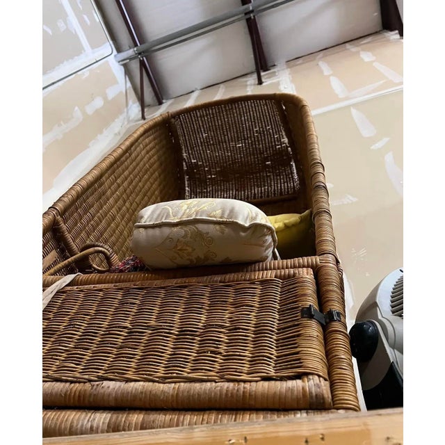 Up for consideration is a beautiful vintage large wicker porter chair with a compartment. This would look lovely in your...