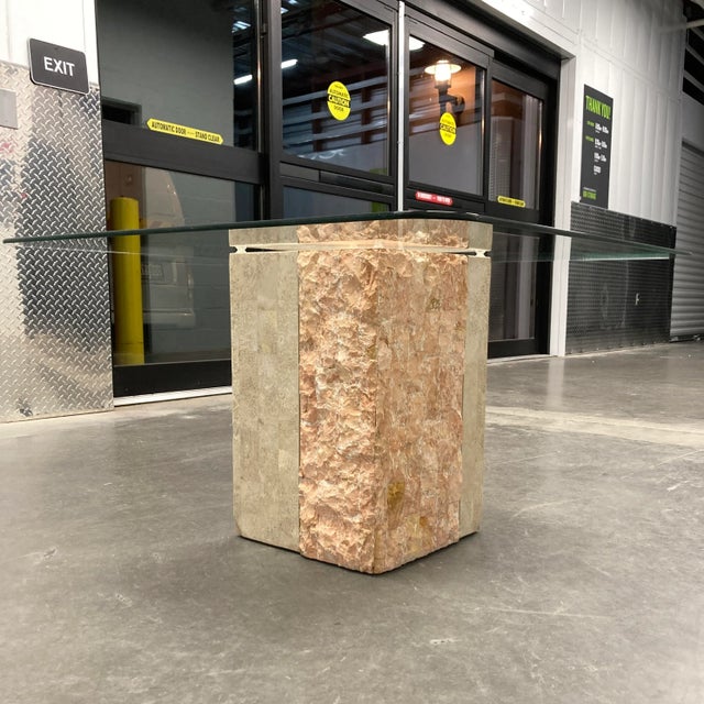 Vintage polished tessellated, and rough cut pink mactan stone pedestal base, with brass inlay square glass top end table...