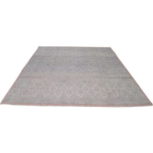 Moroccan Beni Ourain hand knotted rug with natural colors, contemporary style and soft texture.