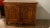 A sturdy French 18th century buffet crafted from walnut with two doors offering ample storage below a single drawer....