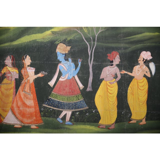 Very decorative Indian Batik representing Krishna. Fabric on Wooden Panel. Frame in Gold Leaf on Wood made to measure in...