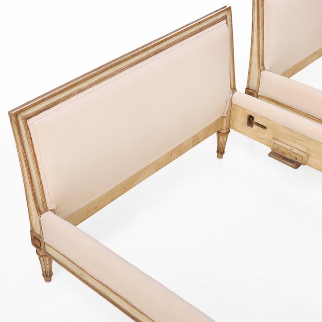 French A Pair of French Louis XVI Style Painted and Gilt Twin Beds, C. 1940. For Sale - Image 3 of 8