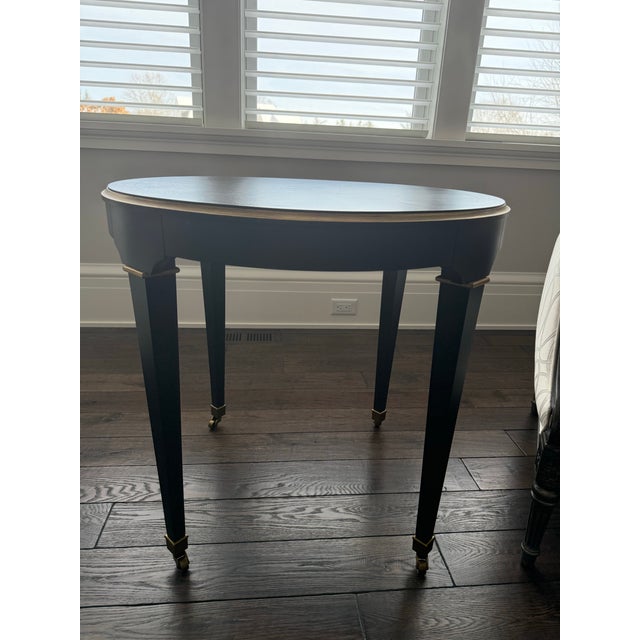 Sunburst-patterned walnut veneers draw all eyes toward whatever precious items you display atop your Elton end table. The...