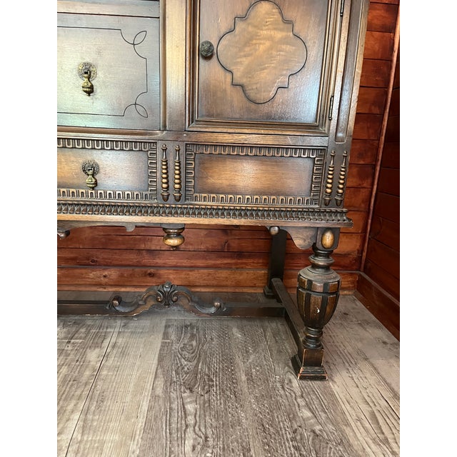 This exceptional heirloom piece features a richly grained walnut body with gorgeous, contrasting burl wood accent panels...