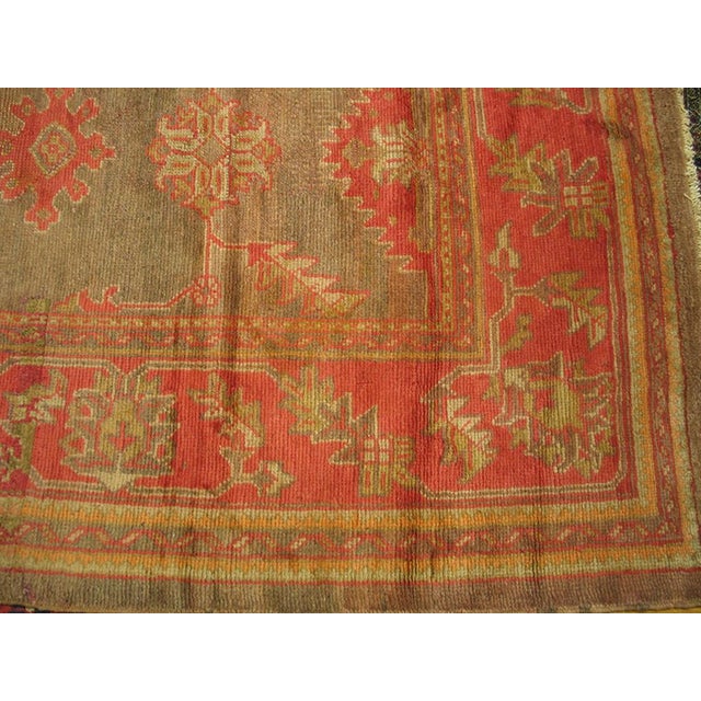 Early 20th Century Turkish Oushak Carpet ( 9'6" x 16'6" - 290 x 503 ) Palmettes and tilted, serrated leaves decorate the...