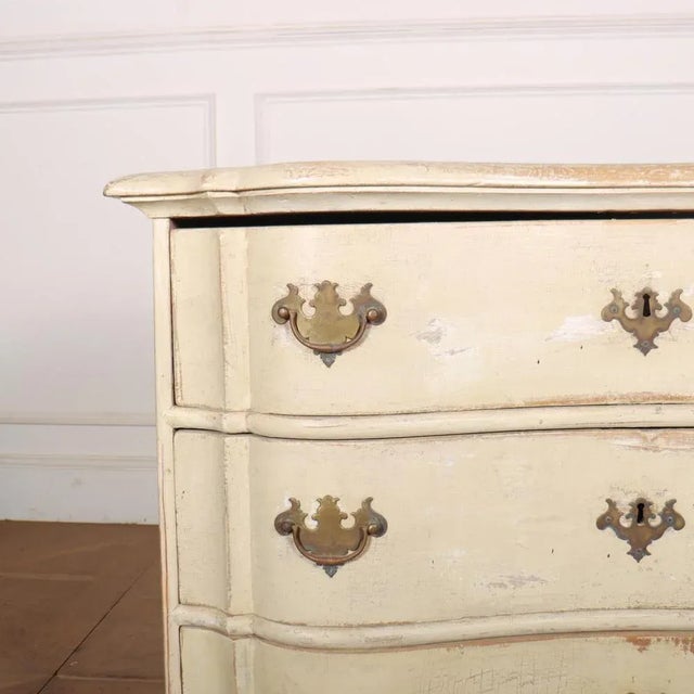 Pretty 18th C original painted Danish commode. 1780. This piece is designed in the style of the selected designer and/or...