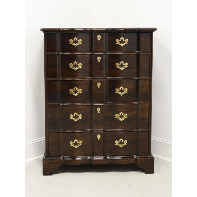 A Traditional style block front chest of drawers by Henredon, from their Folio Fourteen Collection. Mahogany with...