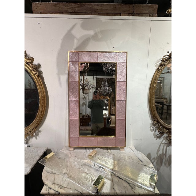 Modern Murano pink glass and brass mirror. Circa 2000. Sure to make a statement!