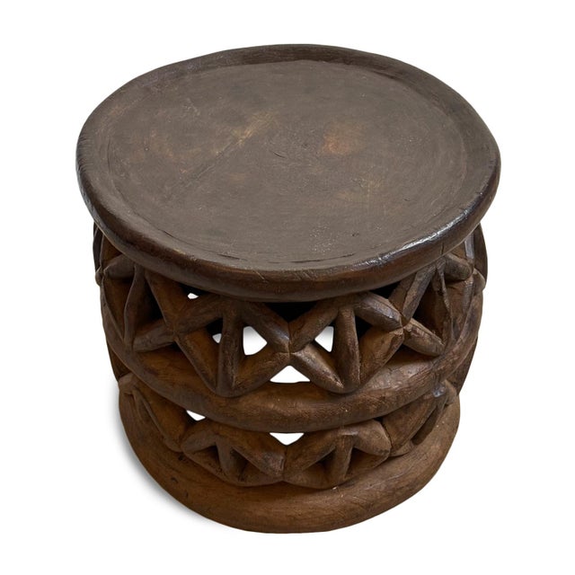 Authentic vintage hand carved Bamileke tribal wood stool/side table. Masterfully crafted from one piece of indigenous...