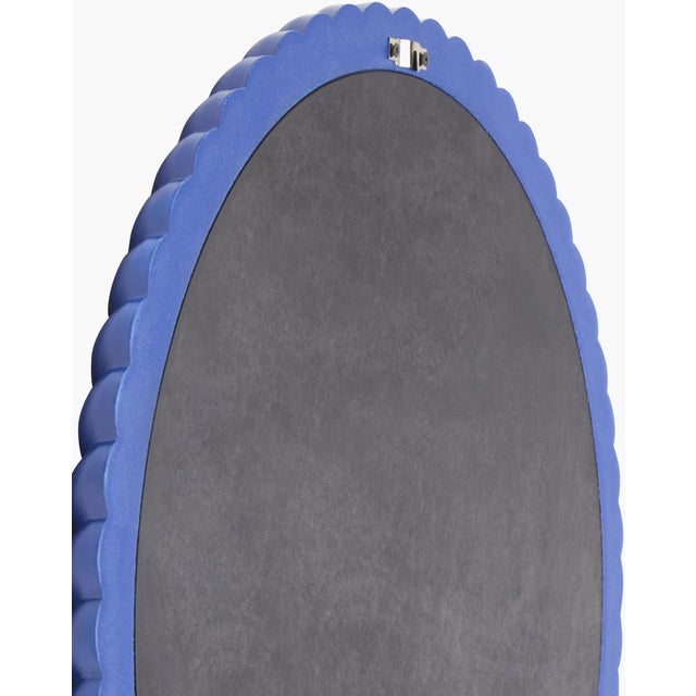 Transform your living space with the Cahaya accent mirror, a stunning piece of wall decor that embodies an updated...