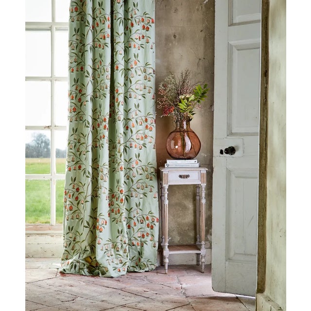 The gently hanging embroidered pendants of these delicate blooms are sensitively stitched to showcase the intricacies of...