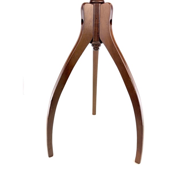 A stunning vintage tripod drinks table imported by R.A. Importing Co., retaining its original Made in Taiwan label. The...