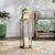 Designed with a tall, slender classic profile, this lantern really makes a statement. The antique brass finish and...