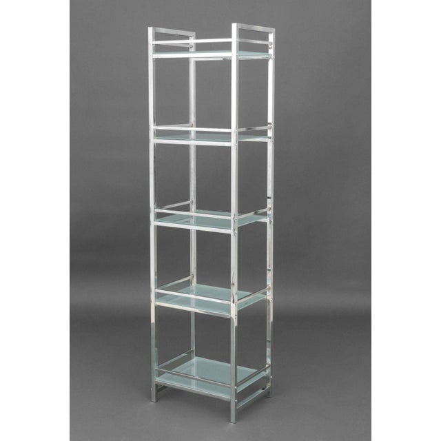 Modern Chromed Metal Etagere Shelf, with tempered glass shelves. 69" H x 18" W x 14.25" D. Provenance: From a 45 Sutton...