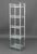 Modern Chromed Metal Etagere Shelf, with tempered glass shelves. 69" H x 18" W x 14.25" D. Provenance: From a 45 Sutton...