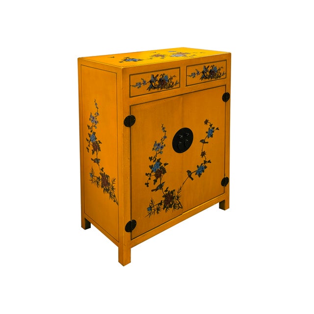 Make a bold, sophisticated statement with this Asian-inspired accent cabinet, bathed in a vibrant mustard yellow lacquer...