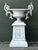 This majestic vintage garden urn on a matching pedestal is a masterful example of Neoclassical and Hollywood Regency...