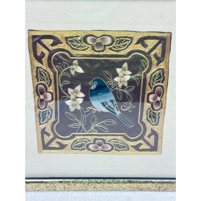 Vintage framed Chinese silk embroidery featuring a bird among flowers. This is a pre-owned item so please see all pictures...