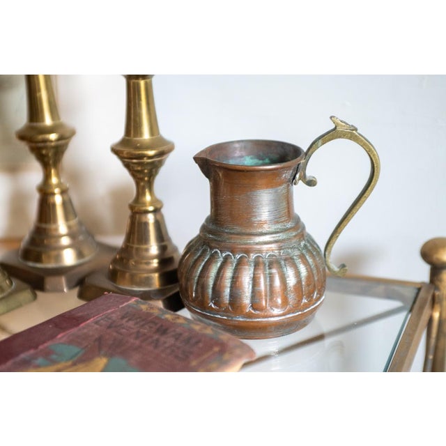 Cute vintage Etruscan style fluted small pitcher, measuring 4" high and about 2" wide, excluding the handle. Copper over...
